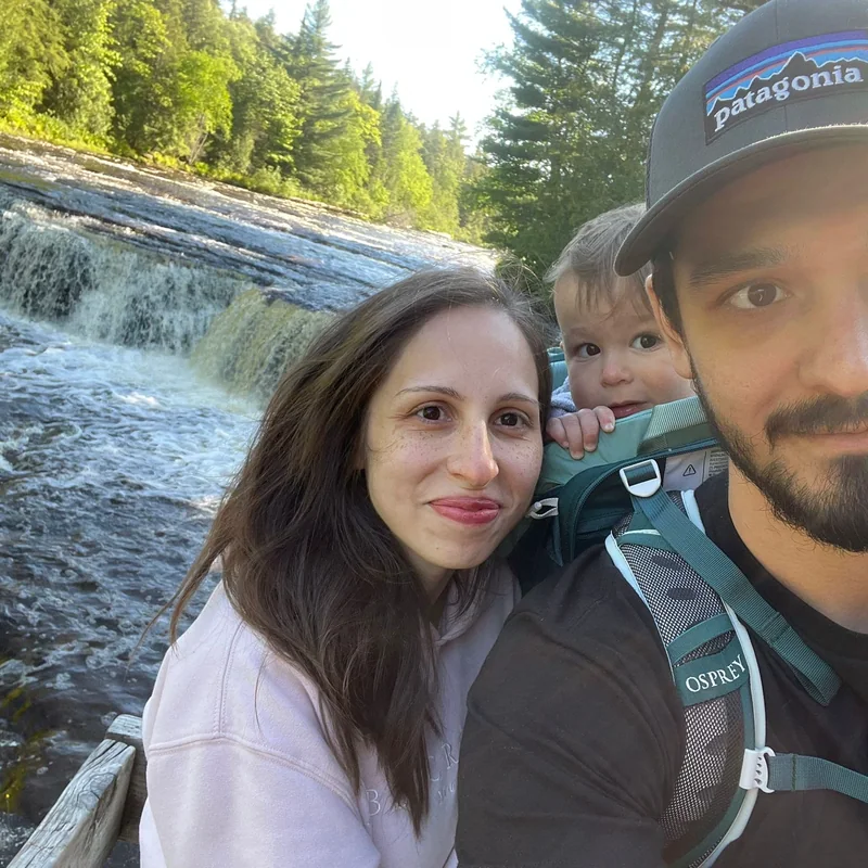 Dr. Dan Serban and his family on a hike at a waterfall