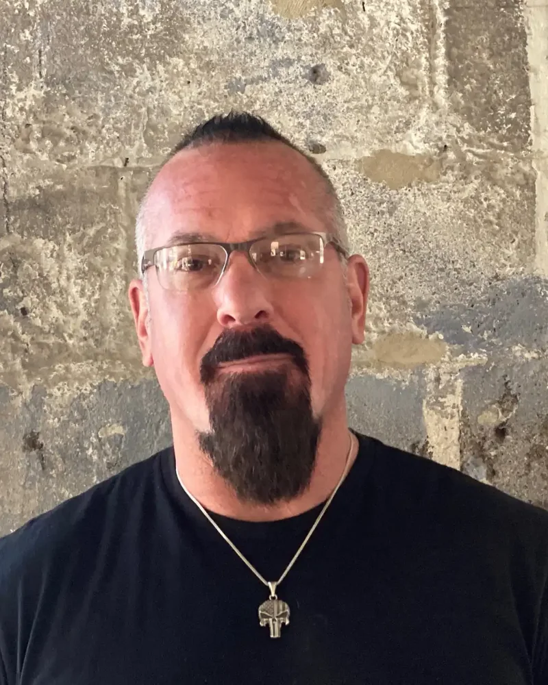 KZ Kane, LMT, neuromuscular restoration therapist and licensed massage therapist